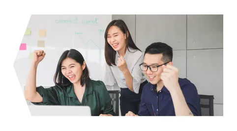 Cargo containers stacked at a shipping yard with cranes